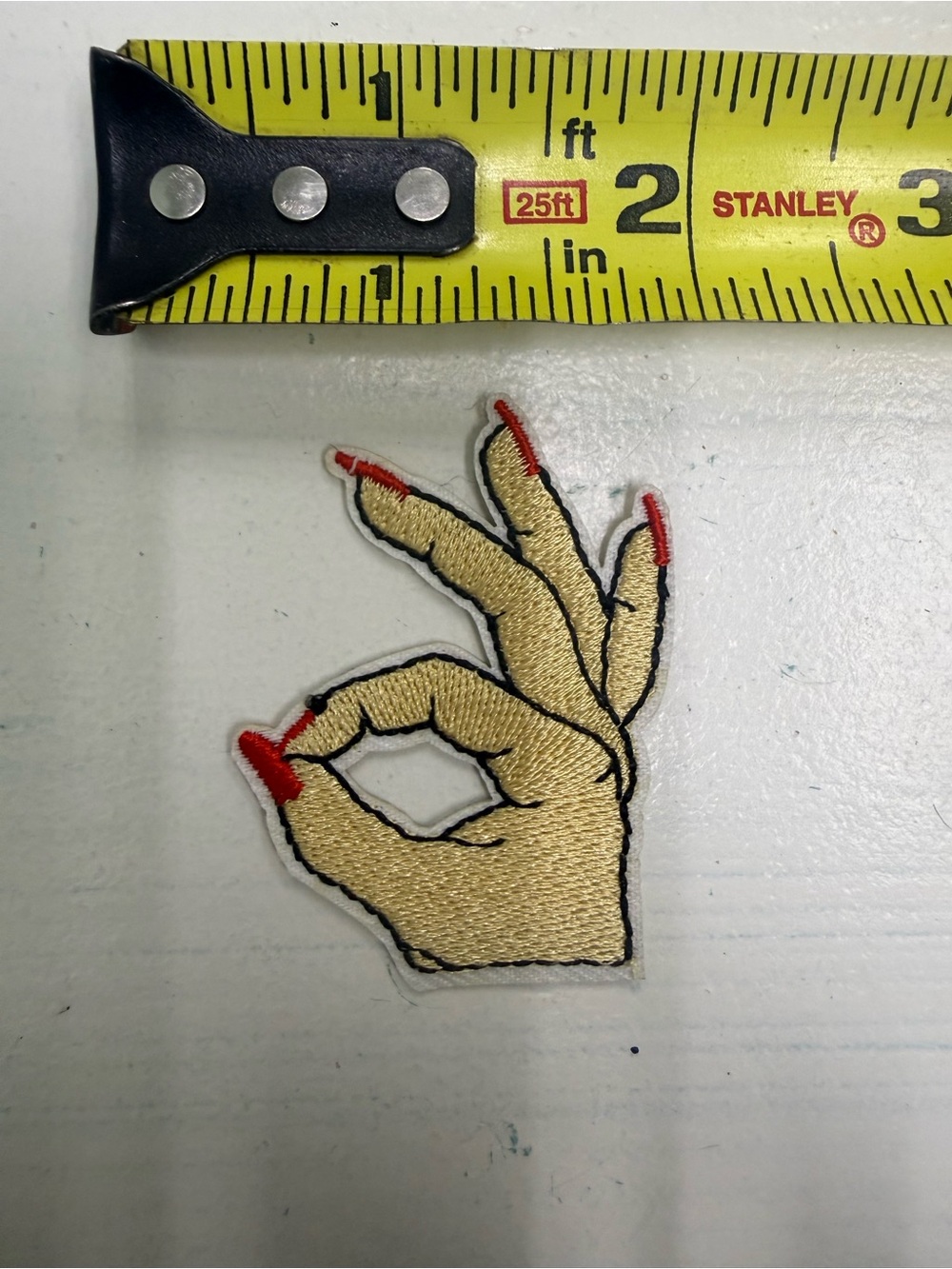 Embroidered Beige Hand Patch with Red Nails - Women Accessories